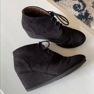 Black wedge heel booties